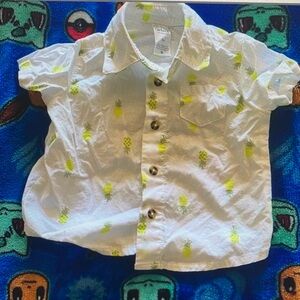 Yellow button down shirt